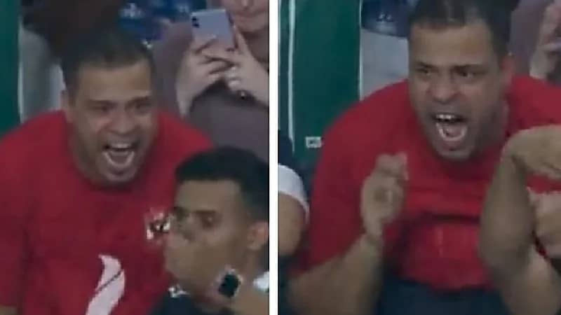 مشجع مصري يحتفل بشكل جنوني أمام آخر جزائري .. فيديو