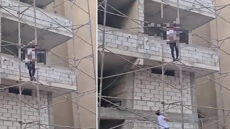 بالفيديو .. شاب يهدد بالانتحار من مكان مرتفع