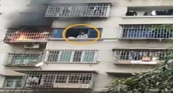 بالفيديو.. فتاة تنجو من حريق بأعجوبة