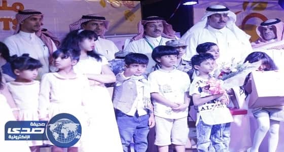 بالصور.. مهرجان الورد بتبوك يكرم أسر شهداء الوطن