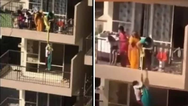 بالفيديو.. أم تدلي بطفلها من الطابق العاشر مربوطًا بملاءة لسبب غريب