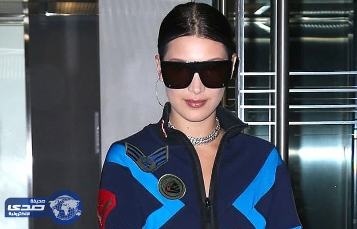 بالصور.. بيلا حديد تتوجه إلى دبي للدعاية لديور مُرتديه حقيبة لمنافستها شانيل