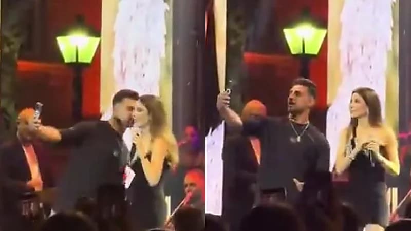 معجب يضع نانسي عجرم في موقف محرج ويفاجئها بقبلة على المسرح.. فيديو