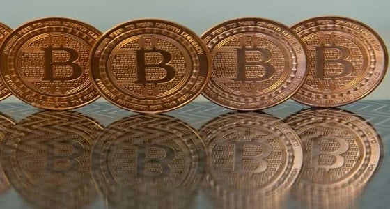 " عالم بورصة " يحذر من تداول البيتكوين