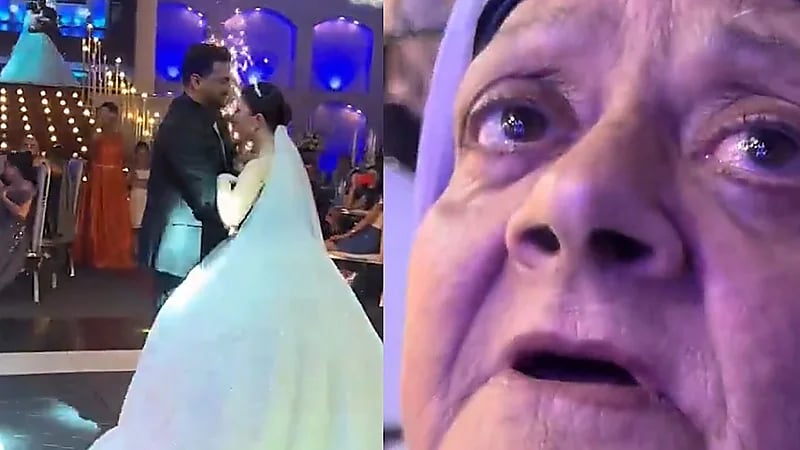 أم تغضب من ابنها في حفل زفافه بعد حمله للعروس .. فيديو