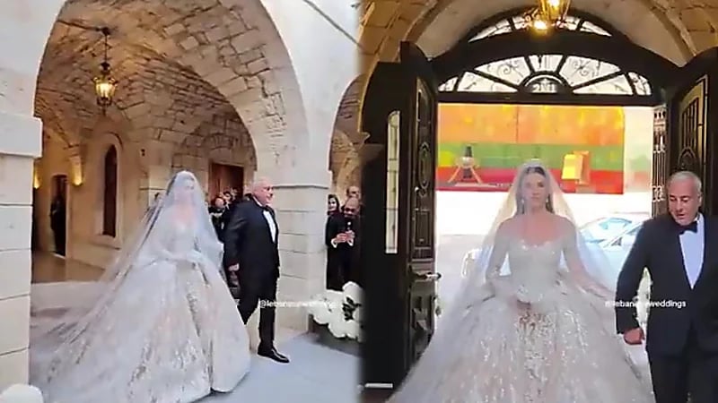 إطلالة عروس ابن المصمم إيلي صعب تخطف الأنظار في حفل زفافهما ..فيديو