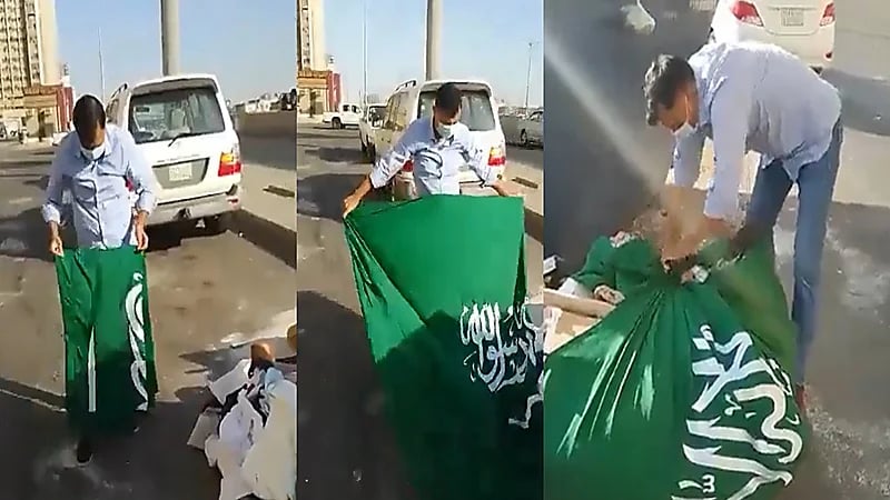 شاهد..شخص يعثر على علم المملكة ملقيًا في الشارع وهذه ردة فعله