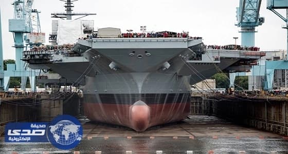 بالصور.. مصري يخترق أغلي حاملة طائرات أمريكية